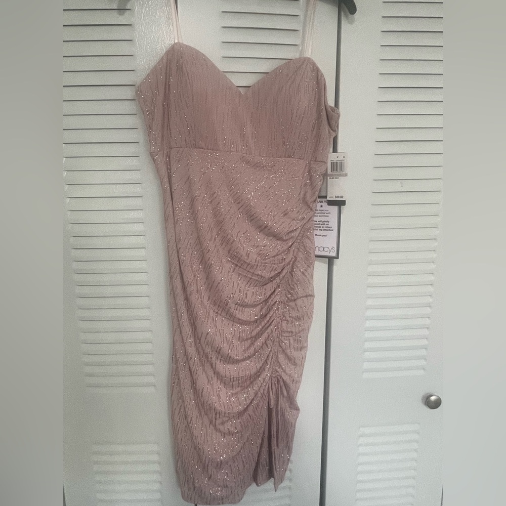 New. Pink, strapless, from fitting dress fits sizes 8-12.